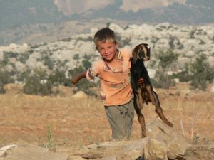 yoruk boy with goat