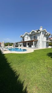 6 Bedroom Central Villa for short term rental in Dalyan - Outside view with lush green garden